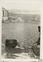 Image of Eskimo [Inuk] with cooking pot